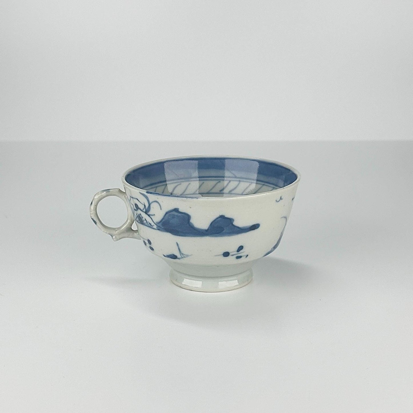 Antique Canton Tea Cup in White and Blue Chinese Pagoda Design