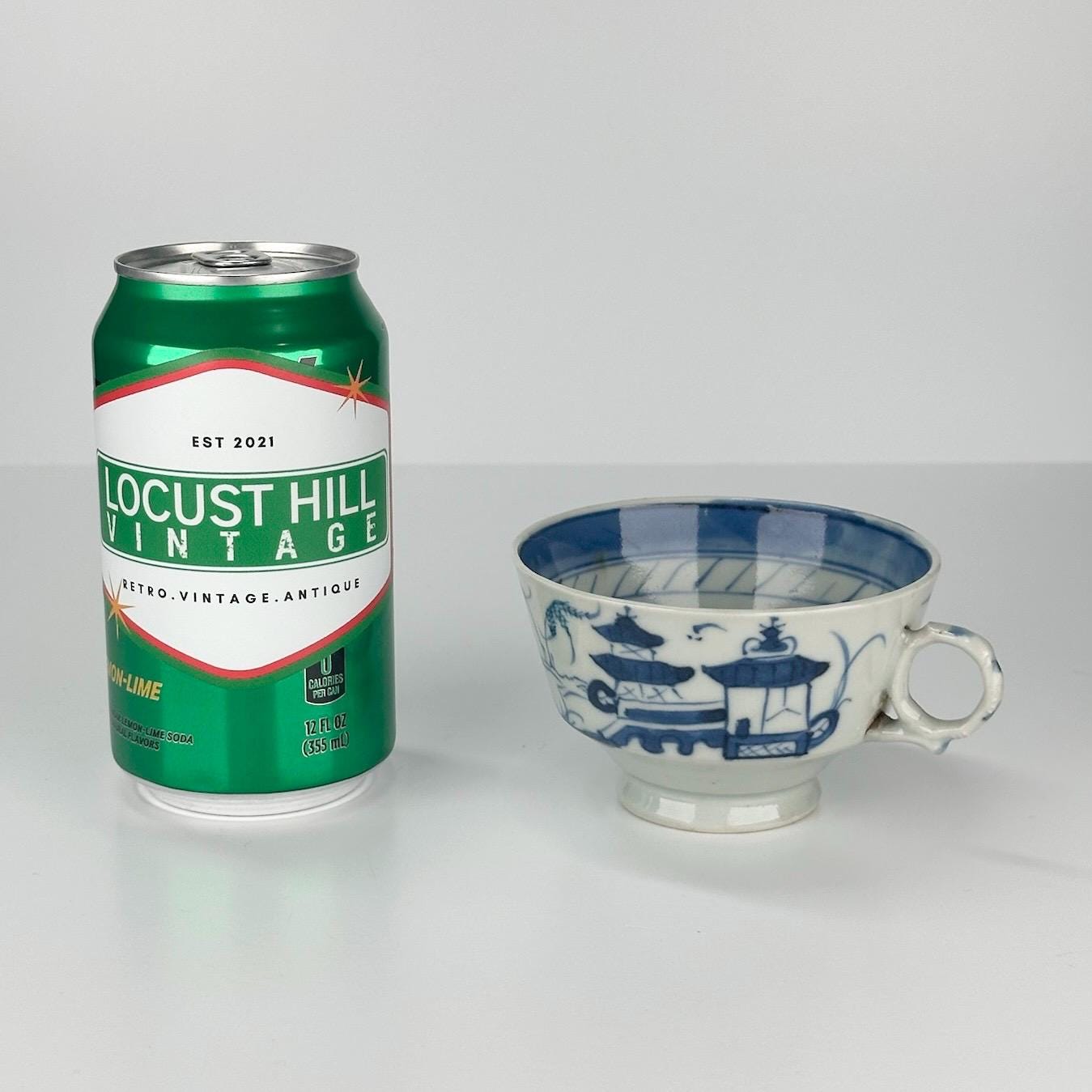 Antique Canton Tea Cup in White and Blue Chinese Pagoda Design