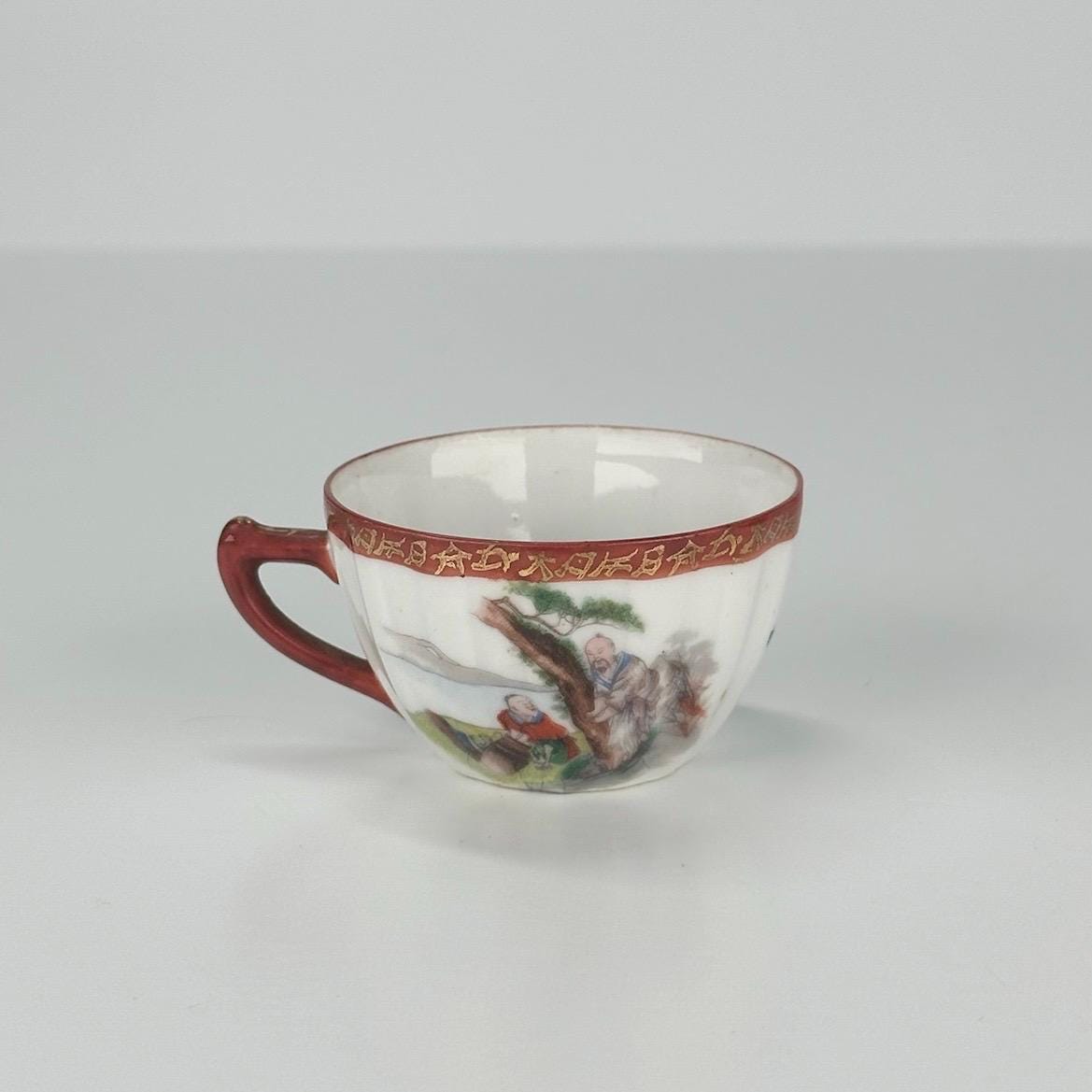 Vintage Porcelain Teacup in Chinese Floral Design