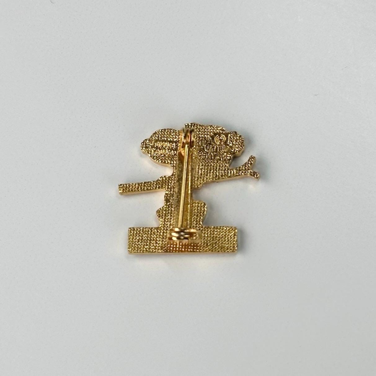 Vintage Brooch or Pin of Snoopy Carrying Skis and Reads Ruidosa