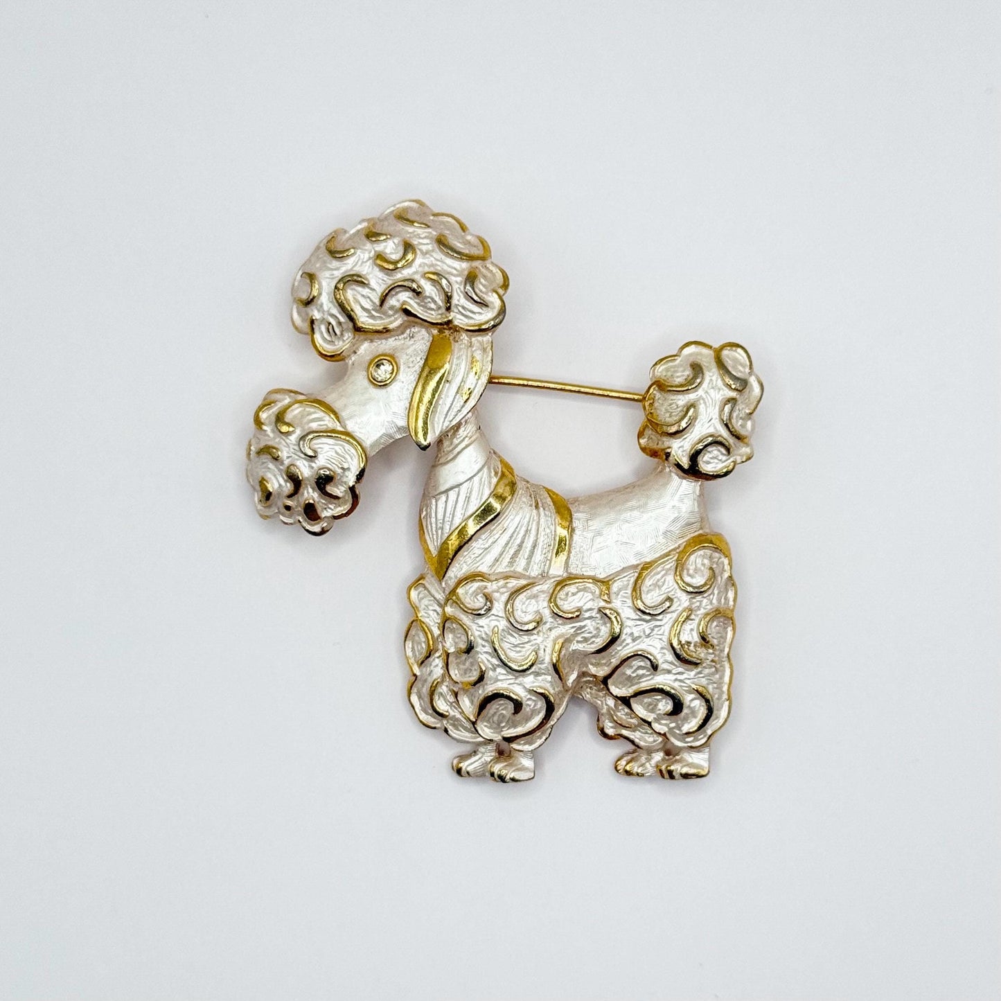 Vintage Brooch of Poodle in Gold Tone White Enamel and Rhinestone Eye by Parklane