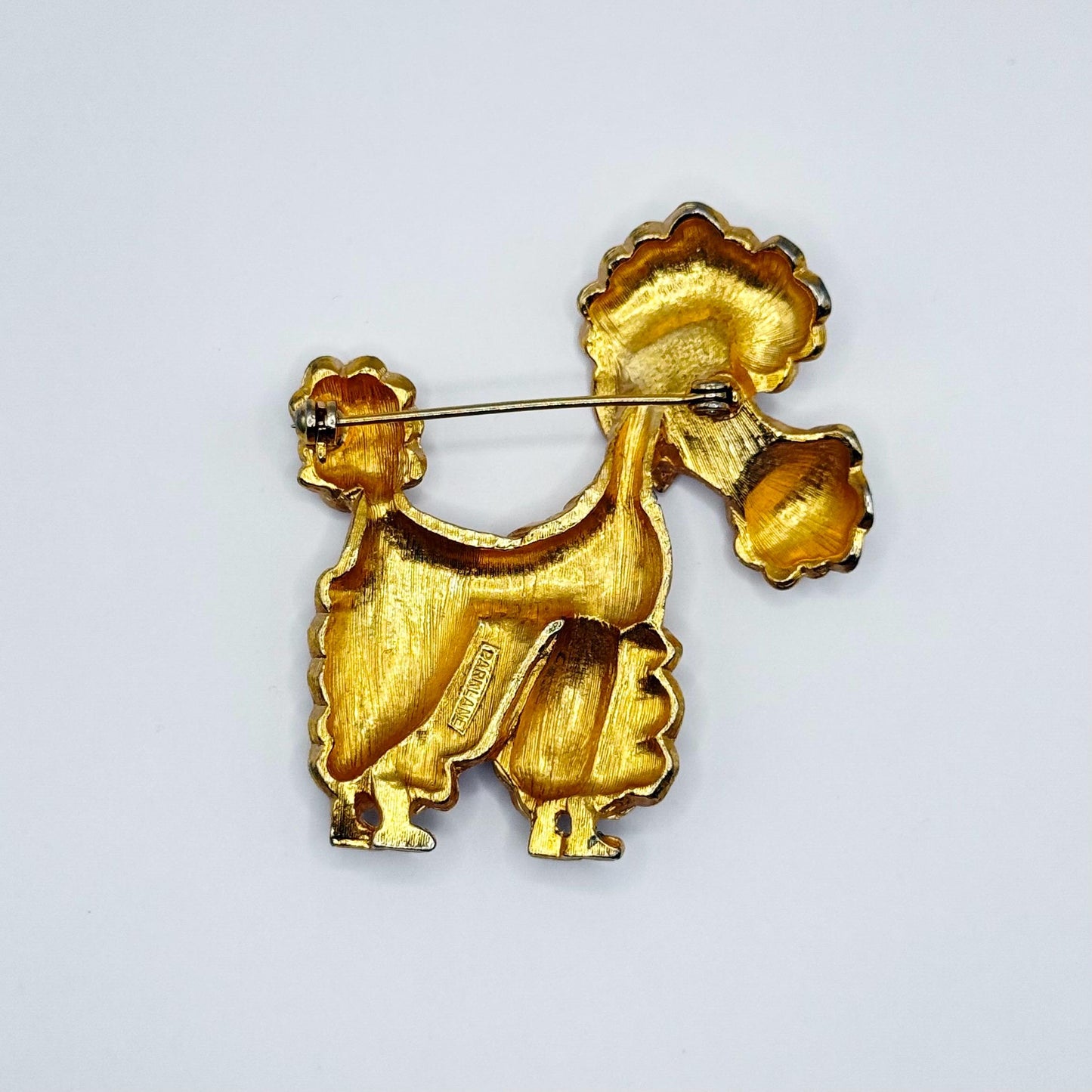 Vintage Brooch of Poodle in Gold Tone White Enamel and Rhinestone Eye by Parklane