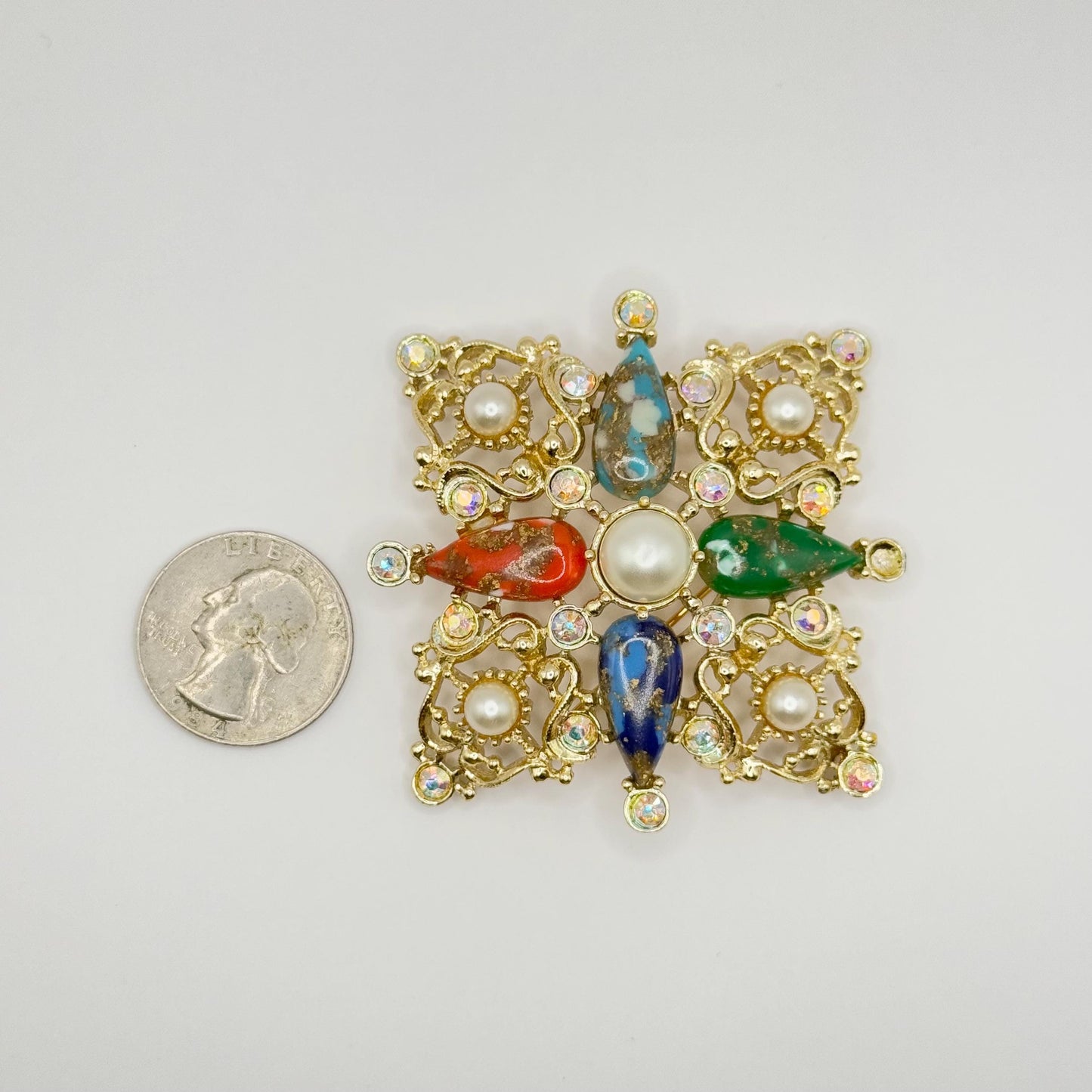 Vintage Brooch by Sarah Coventry of Maltese Cross in Gold Tone Rhinestone Lucite Pin