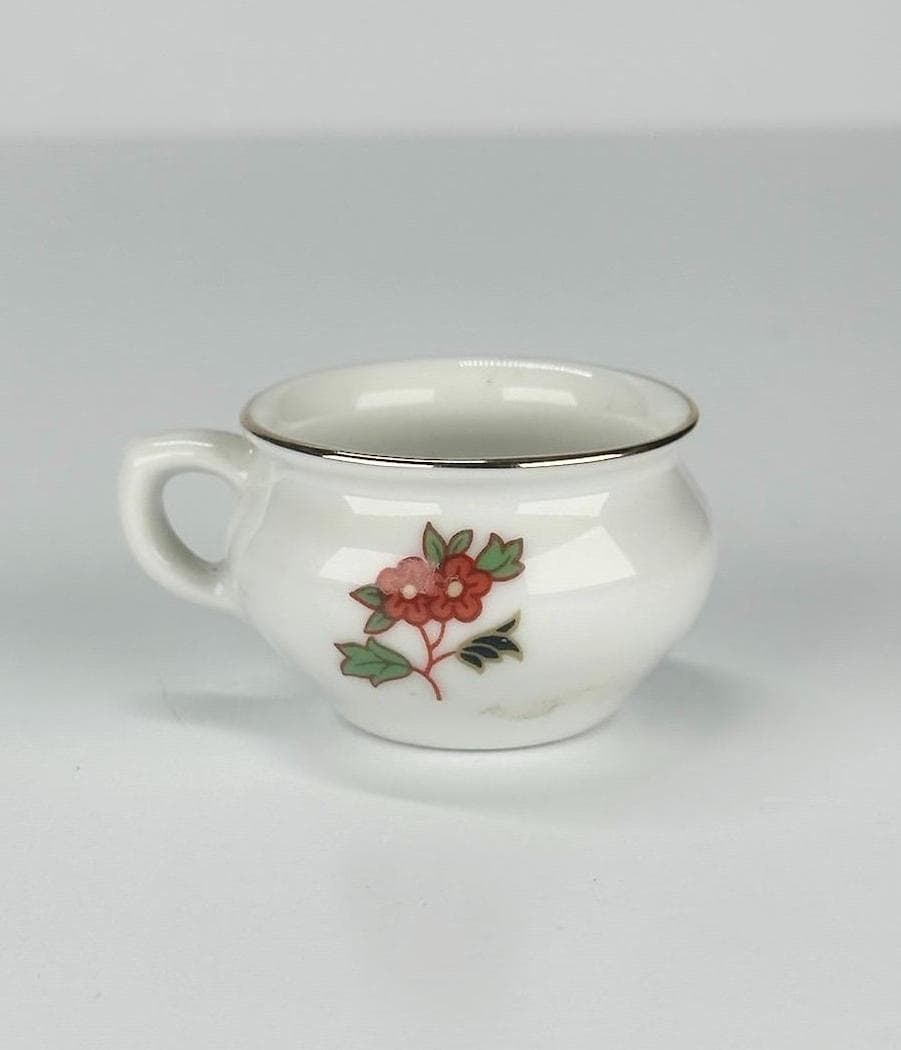 Vintage Miniature Tea Cup with Floral Design and Gold Rim