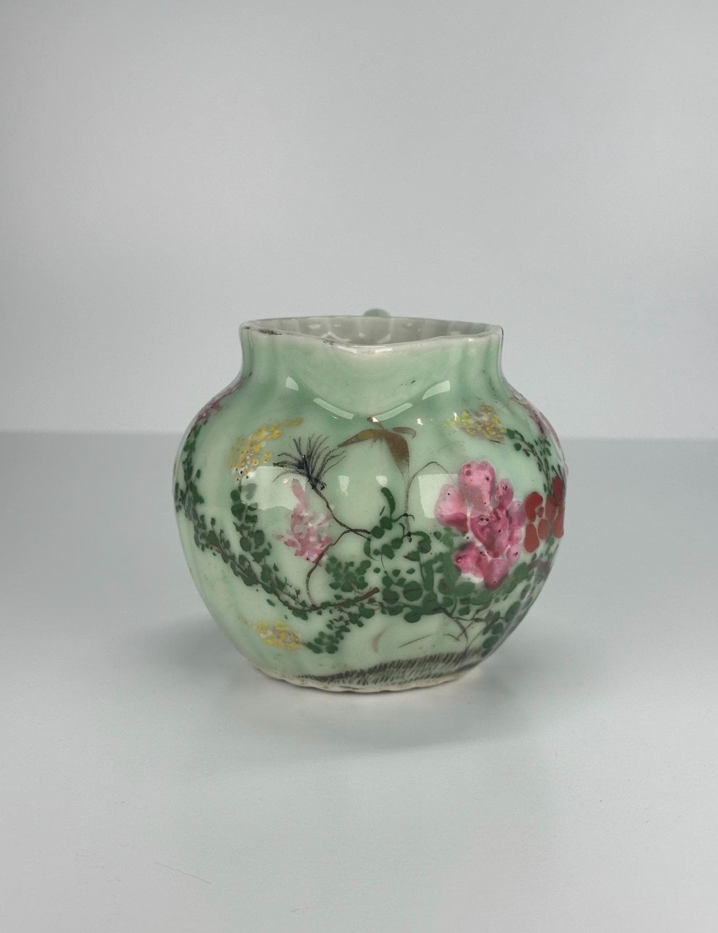 Antique Pitcher Made of Celadon Glazed Porcelain with Hand Painted Floral Design