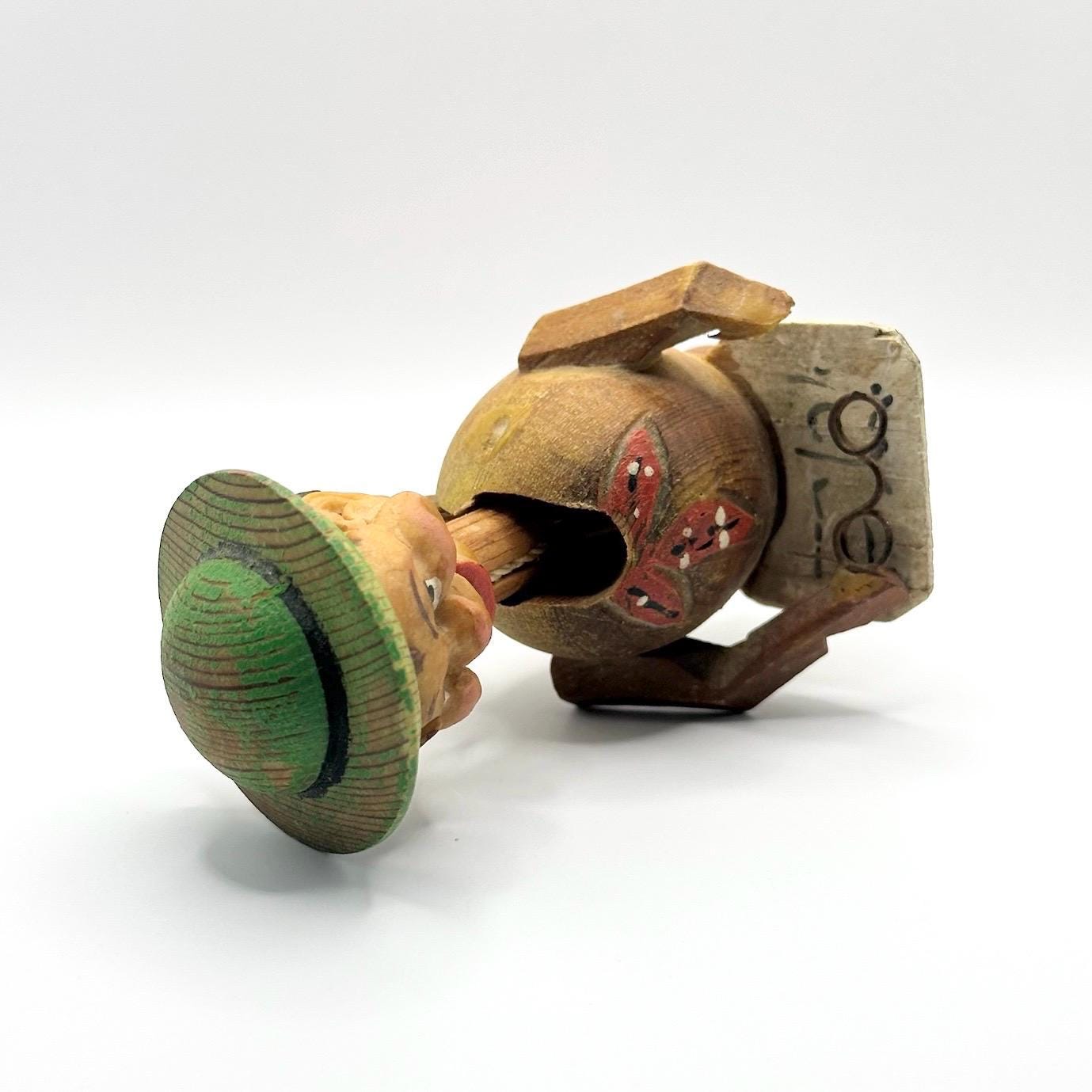 Vintage Bottle Stopper in ANRI Style Design of Hand Carved Man Reading a Book