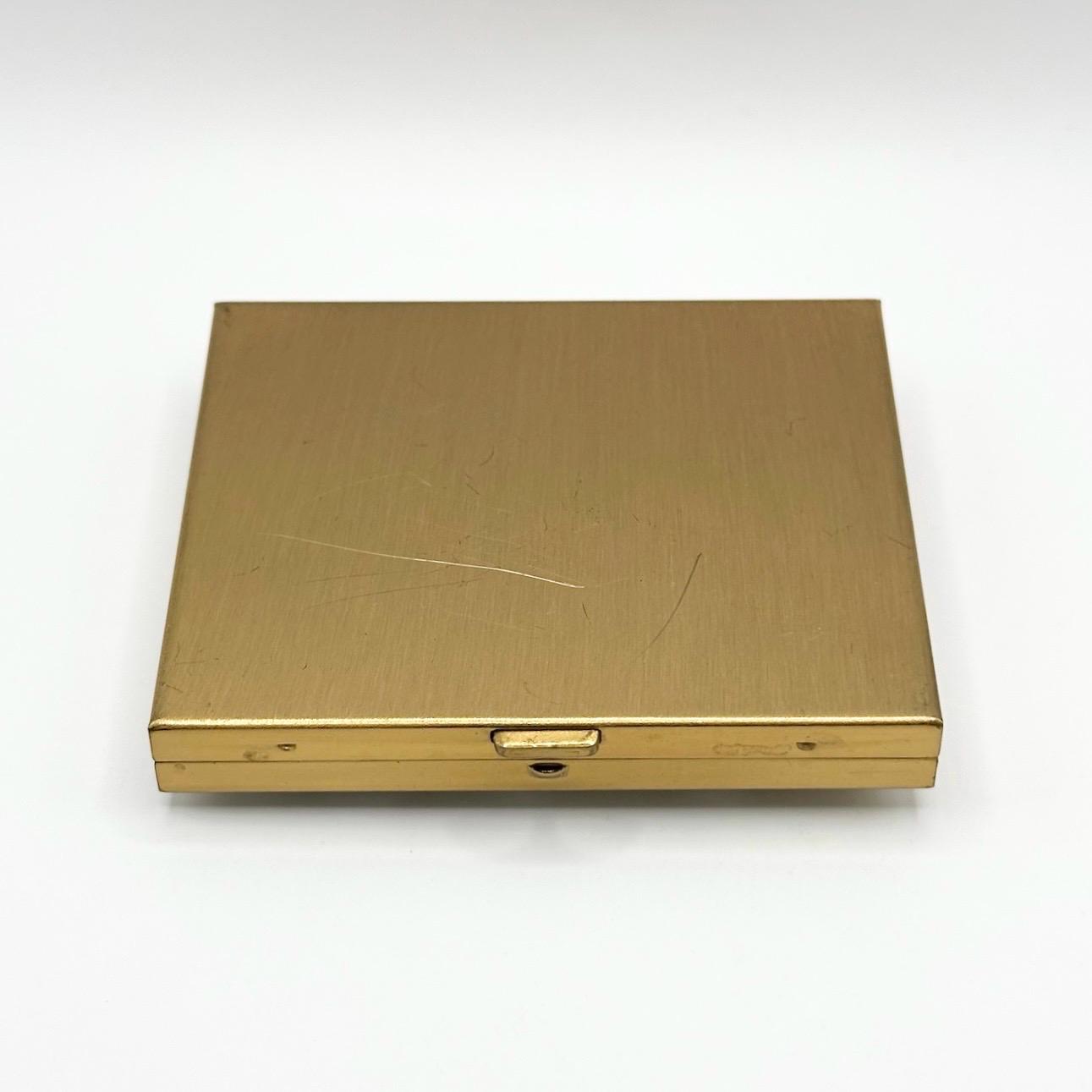 Vintage Compact with Encased Mother of Pearl Cover in Gold Tone Case and Applicator