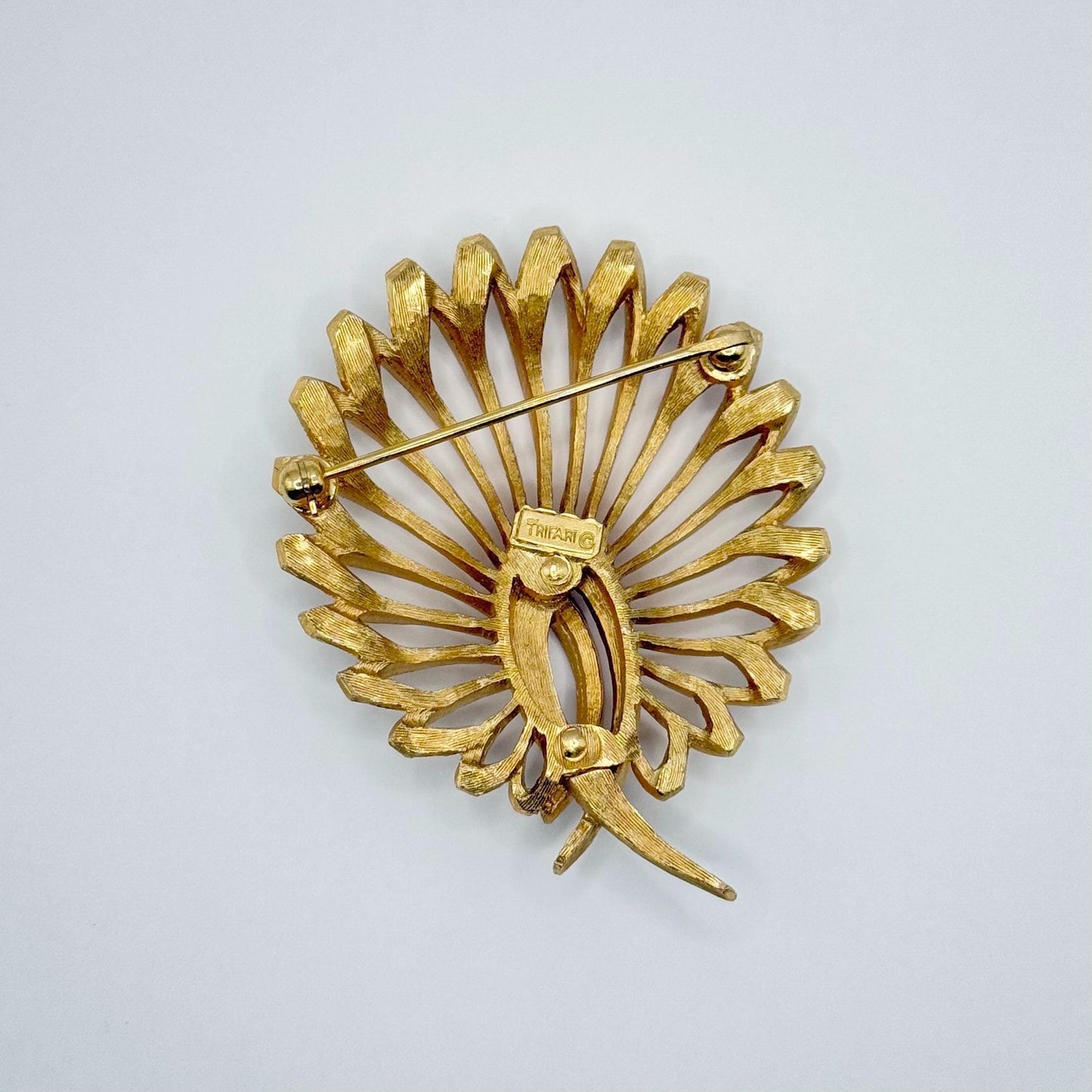 Vintage Brooch Pin with Peacock Tail Design in Gold Tone and Stamped Crown Trifari