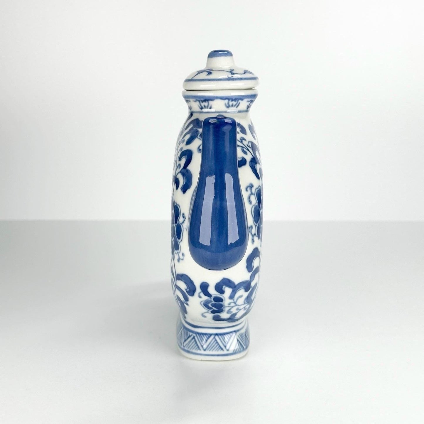 Vintage Teapot with Blue and White Floral Design in a Narrow Donut Shape