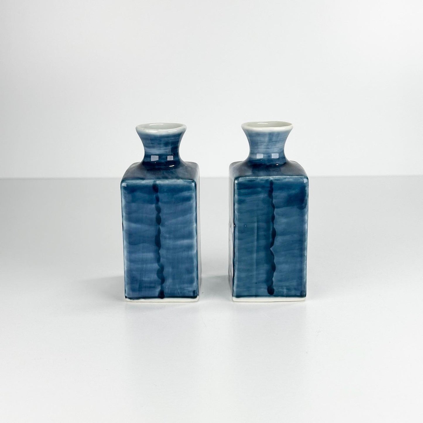 Vintage Japanese Vases with Hand Painted White Flower on Blue Background