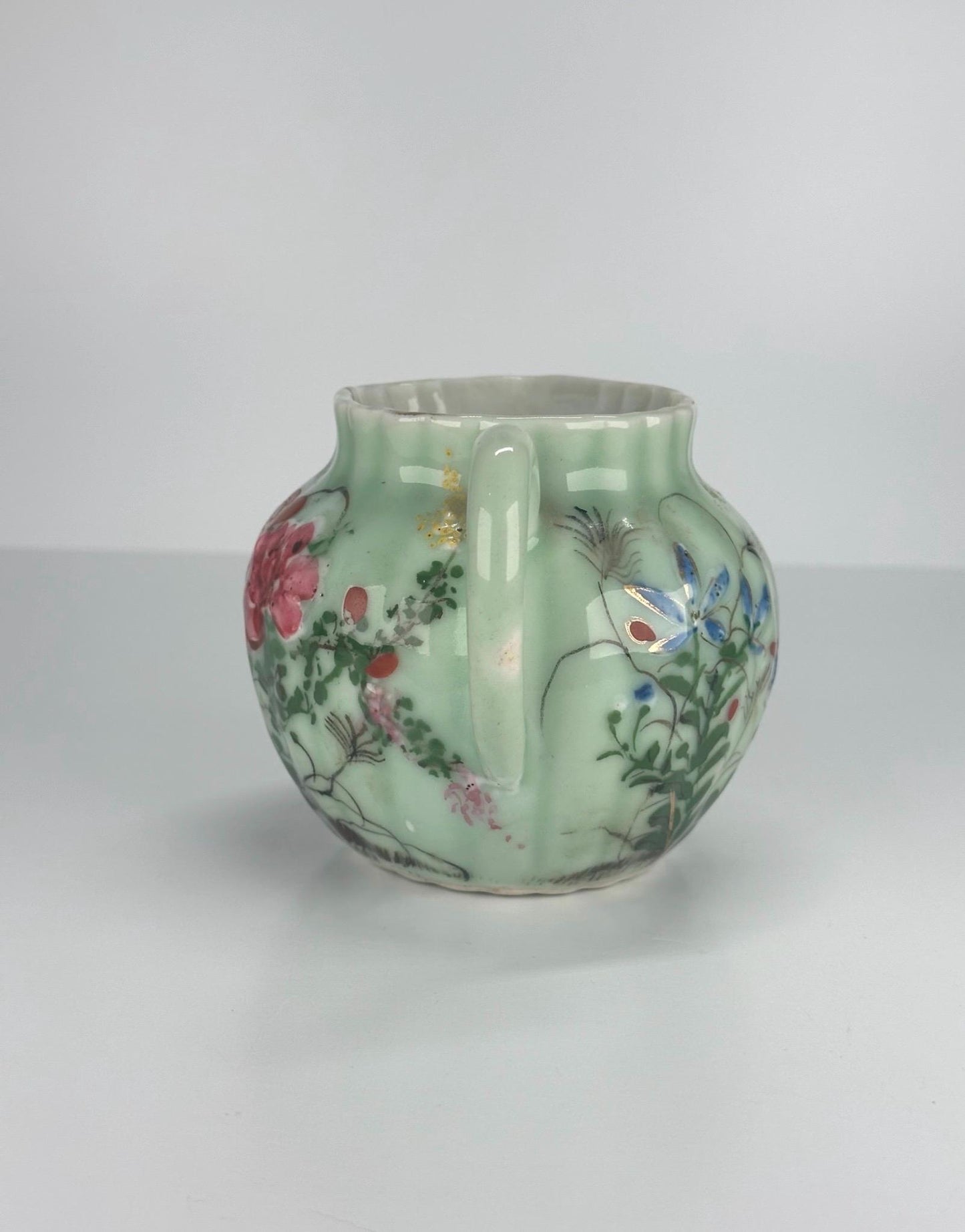 Antique Pitcher Made of Celadon Glazed Porcelain with Hand Painted Floral Design