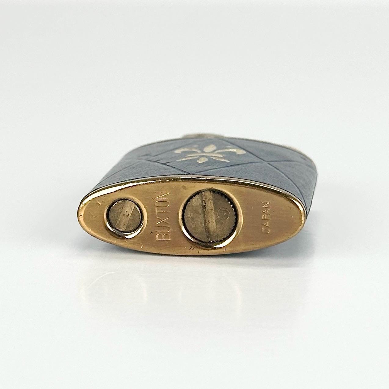 Vintage Lighter with Fleur-de-lis Design and Leather Wrapped Made by Buxton in Japan