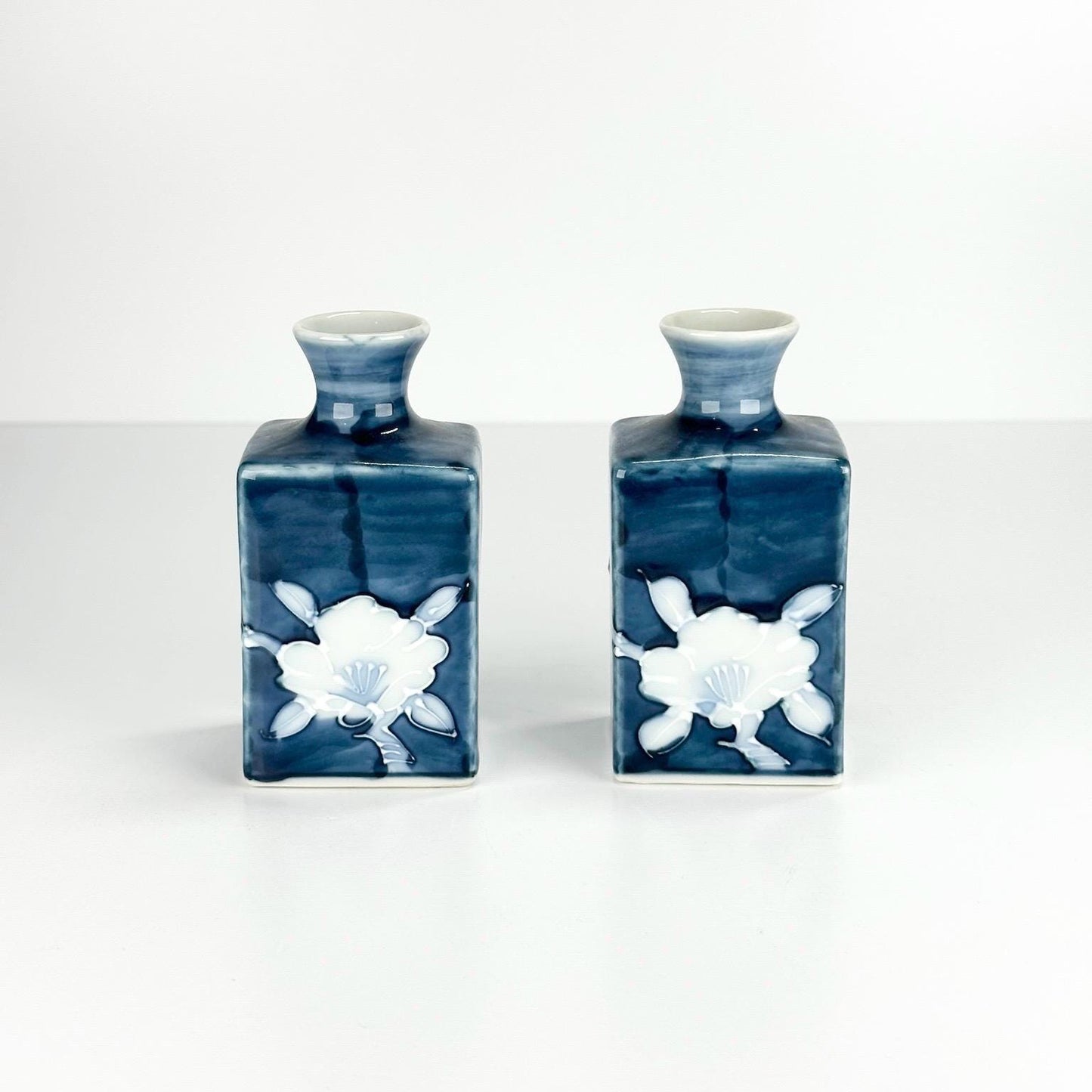 Vintage Japanese Vases with Hand Painted White Flower on Blue Background