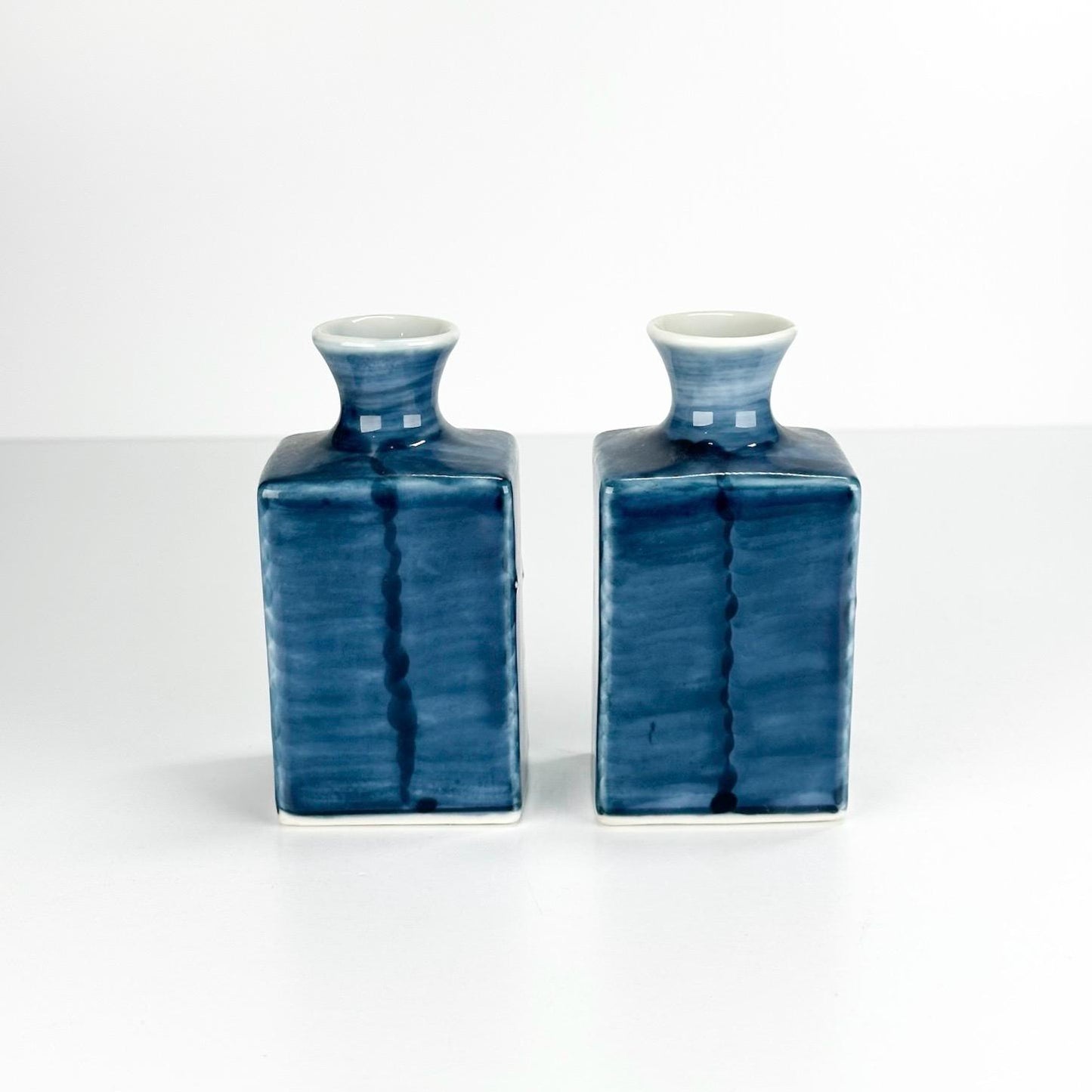 Vintage Japanese Vases with Hand Painted White Flower on Blue Background