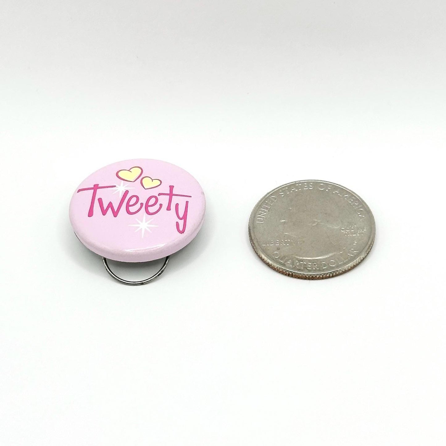 Vintage Clip On Button Reads Tweety on a Pink Background with Yellow Hearts