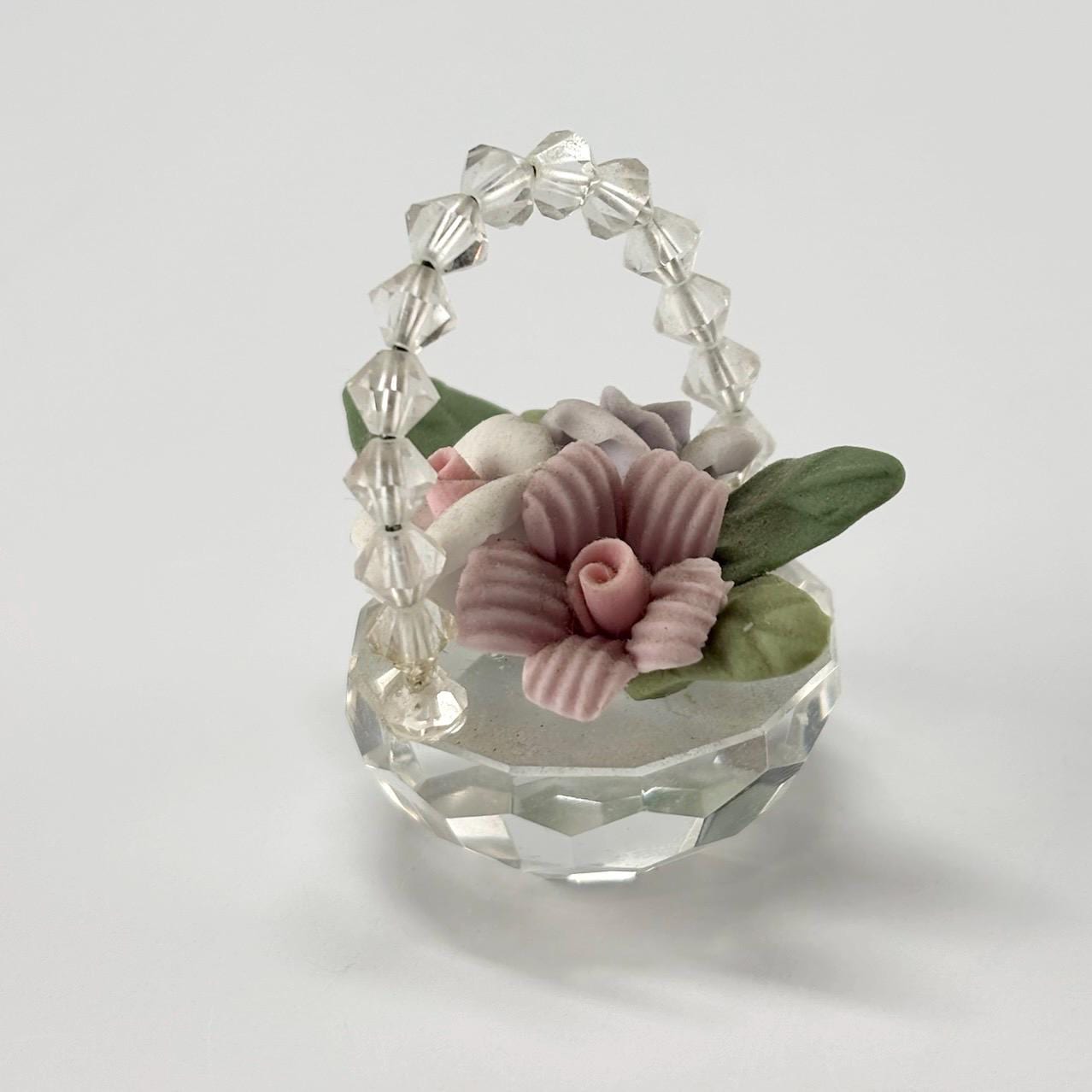 Vintage Figurine of Crystal Glass Flower Basket with Pink, Purple, and White Flowers.