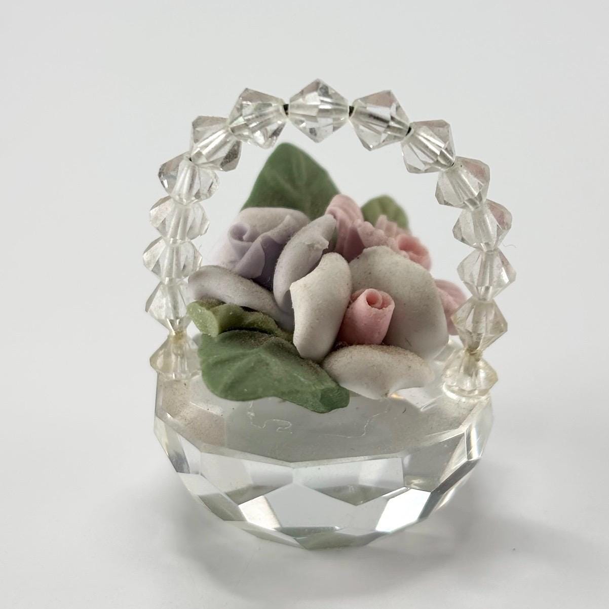 Vintage Figurine of Crystal Glass Flower Basket with Pink, Purple, and White Flowers.
