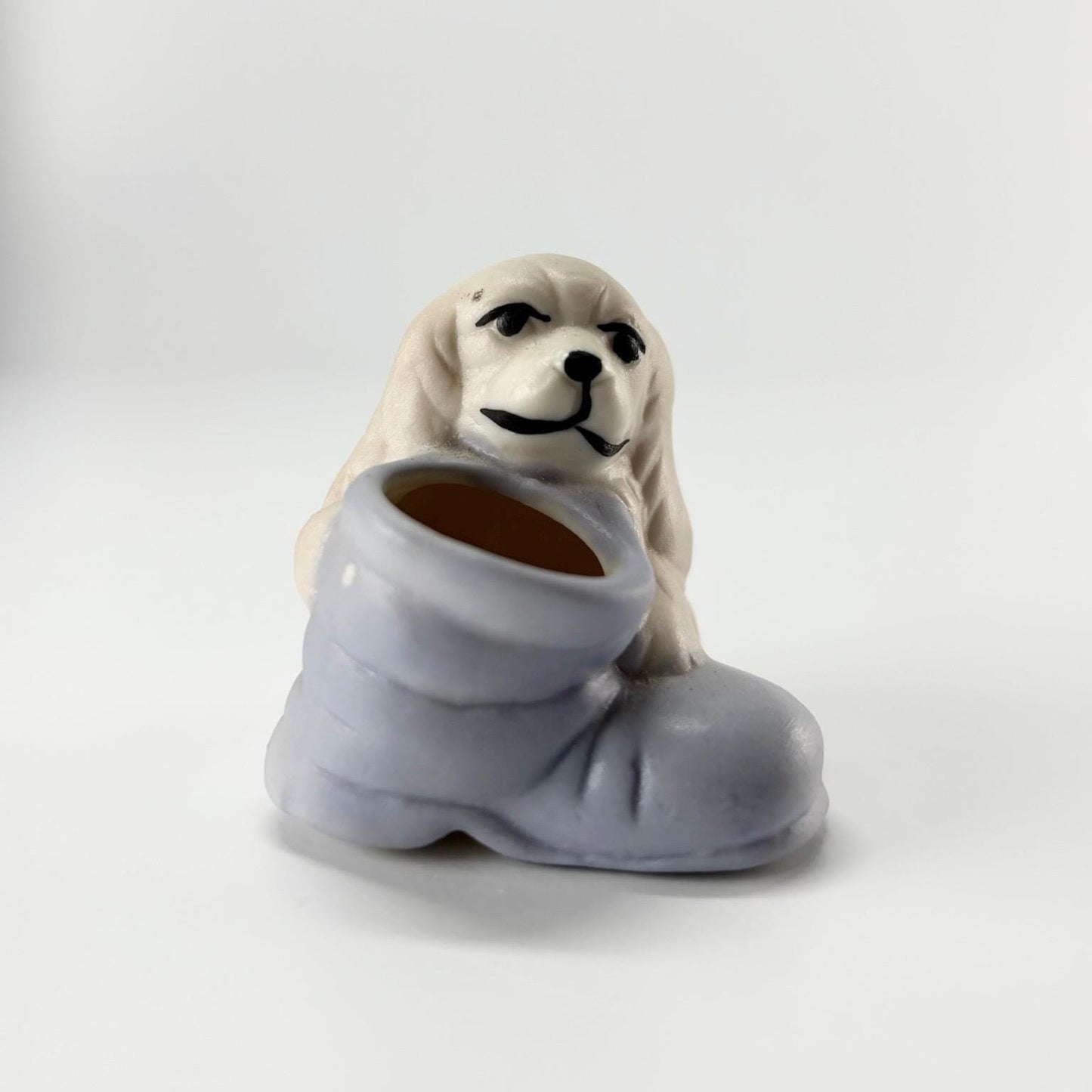 Vintage Miniature Figurine of Cocker Spaniel Puppy in a Purple Boot
