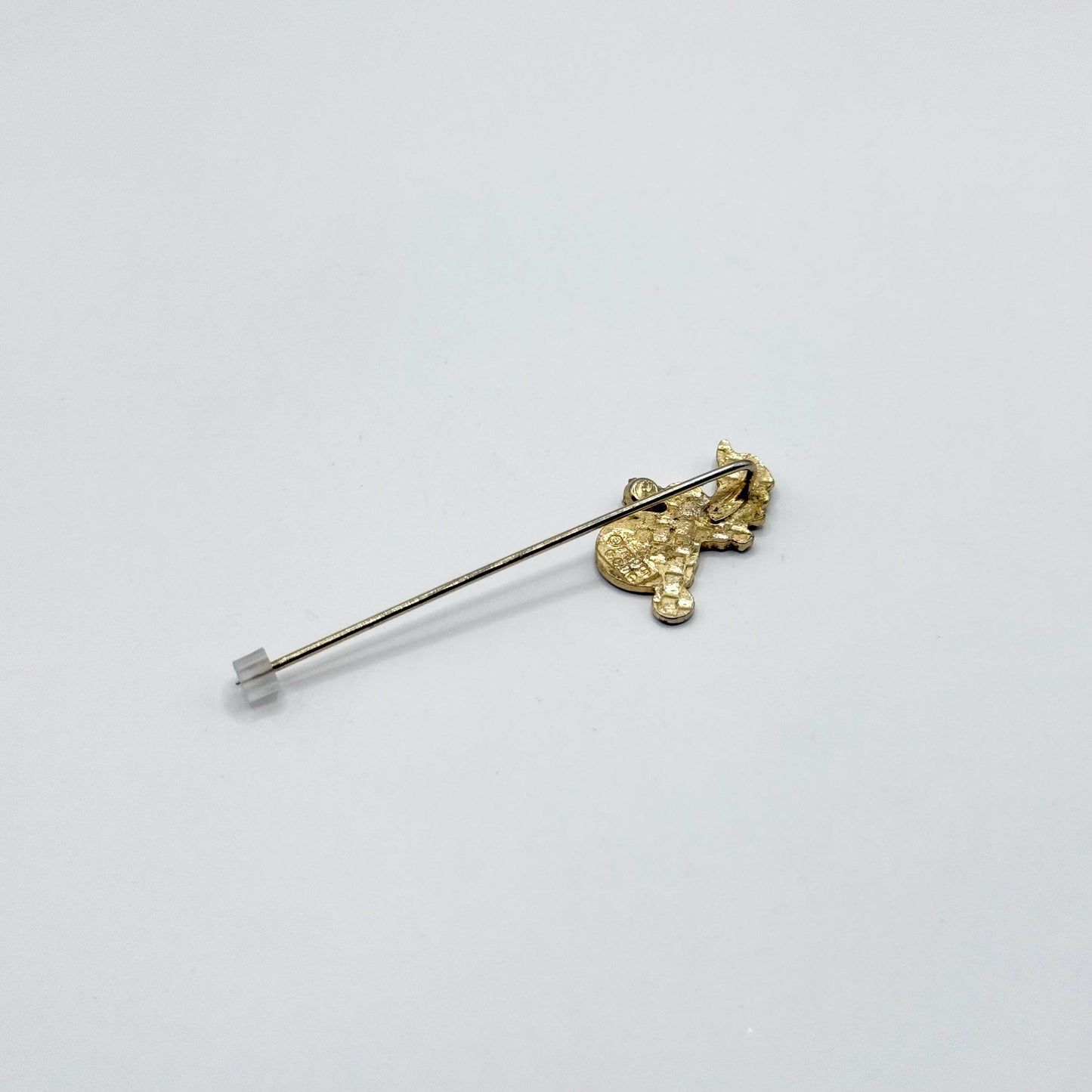 Vintage Stickpin of Girl on Bike With Flower Basket Detail