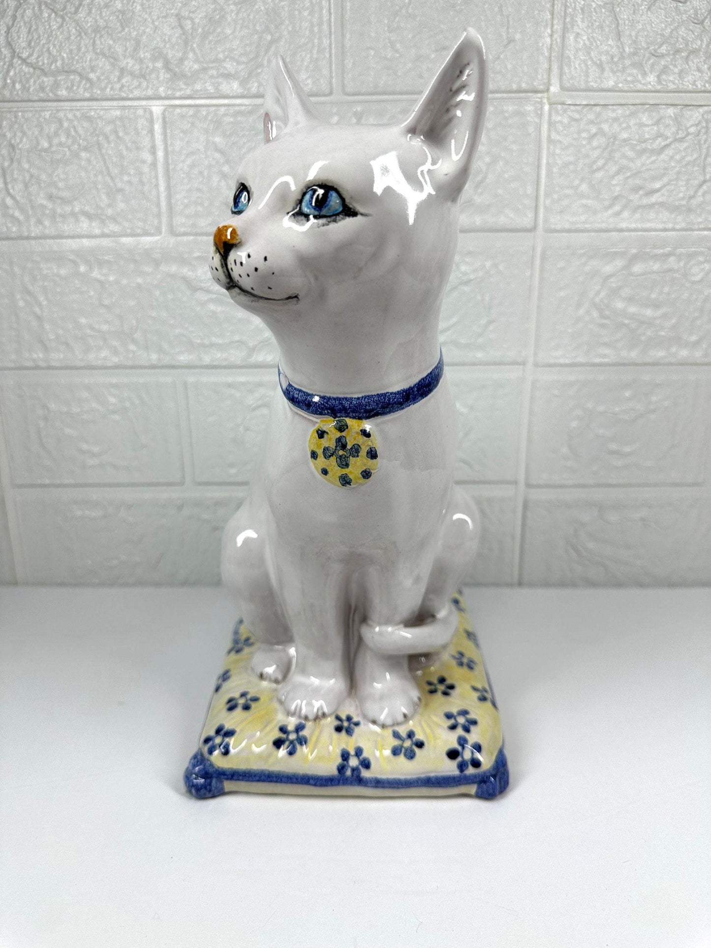 Vintage Ceramic Cat with Blue Eyes, On Yellow Pillow, Majolica Pottery Made in Italy.