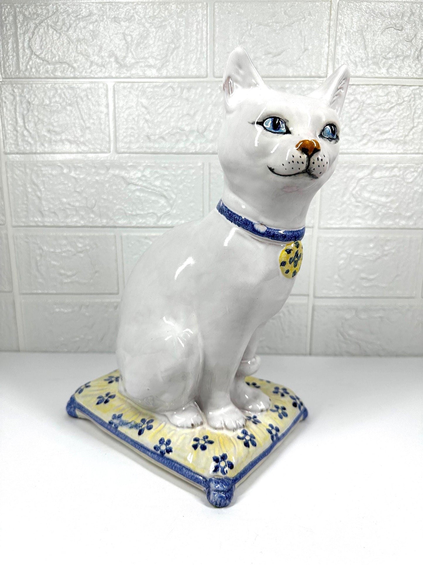 Vintage Ceramic Cat with Blue Eyes, On Yellow Pillow, Majolica Pottery Made in Italy.