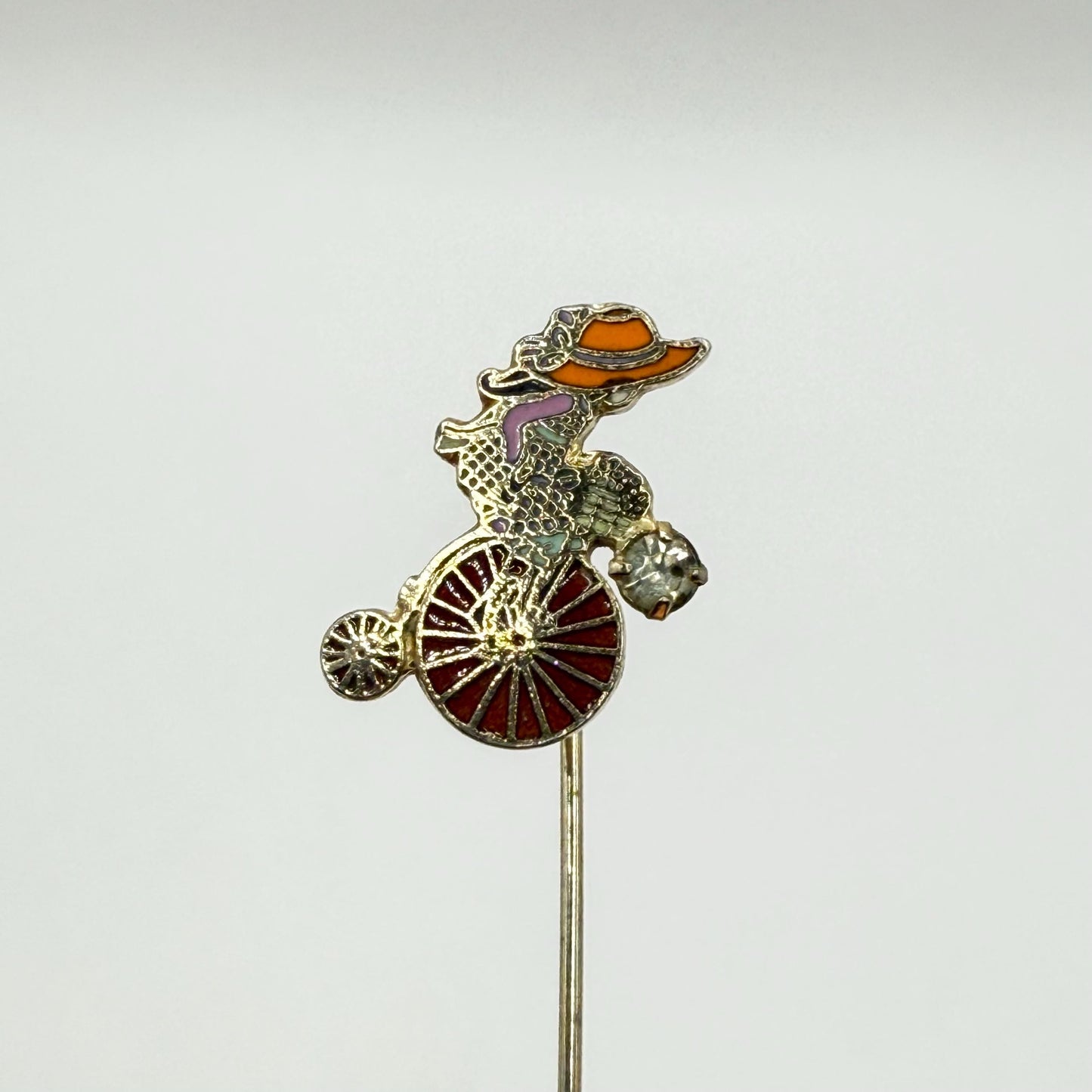 Vintage Stickpin of Girl on Bike With Flower Basket Detail