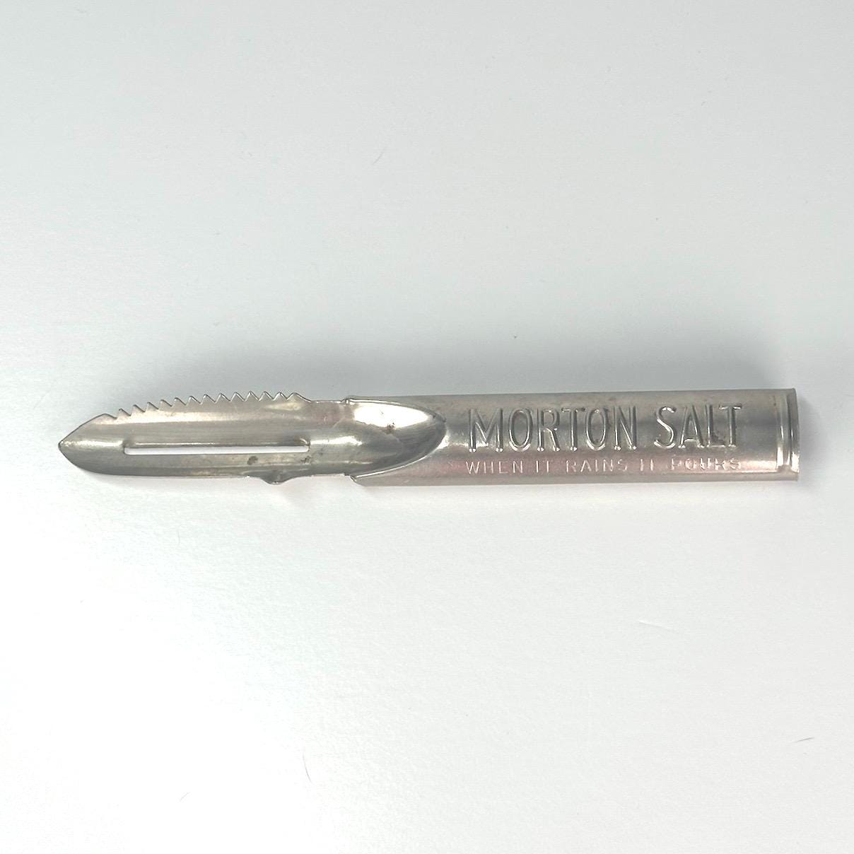 Vintage Vegetable Peeler Engraved with "When it Rains it Pours" by Morton Salt