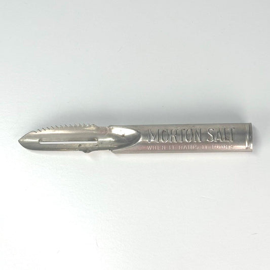 Vintage Vegetable Peeler Engraved with "When it Rains it Pours" by Morton Salt