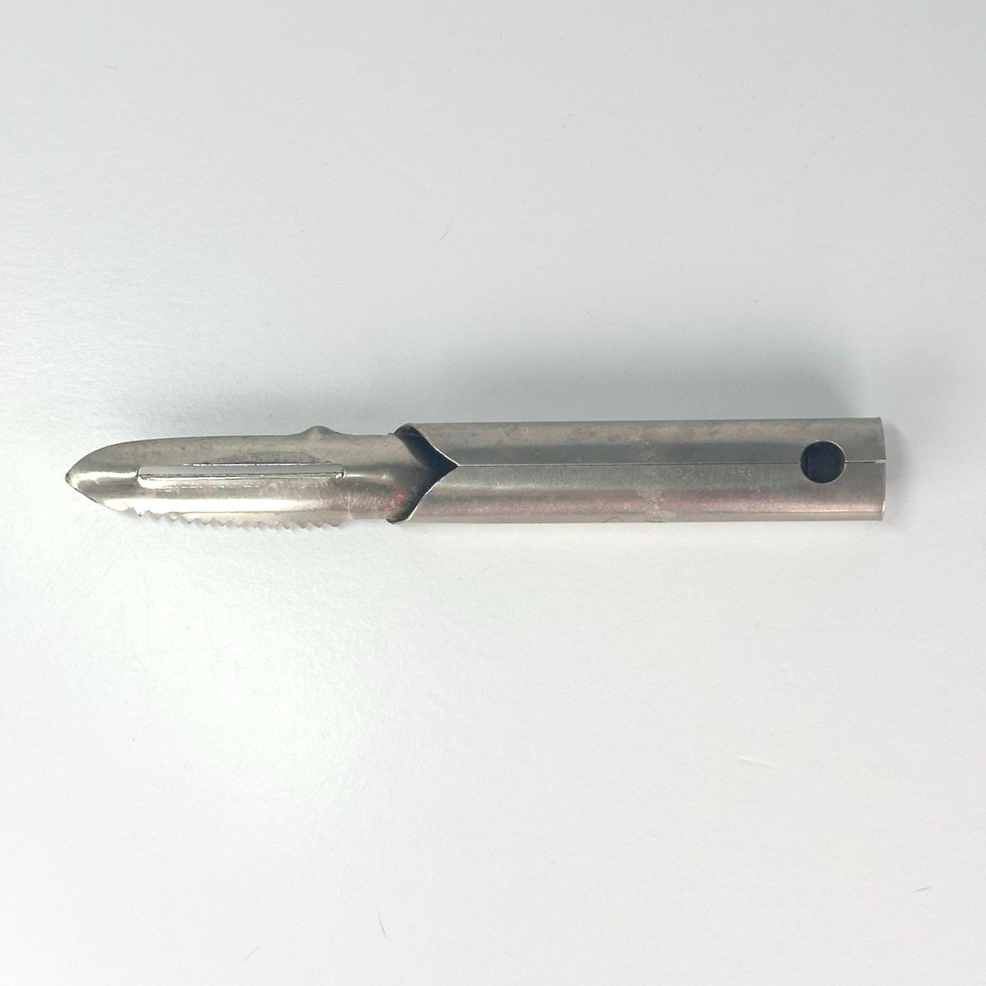 Vintage Vegetable Peeler Engraved with "When it Rains it Pours" by Morton Salt