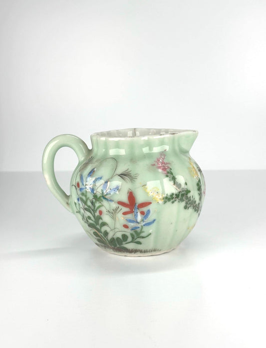 Antique Pitcher Made of Celadon Glazed Porcelain with Hand Painted Floral Design
