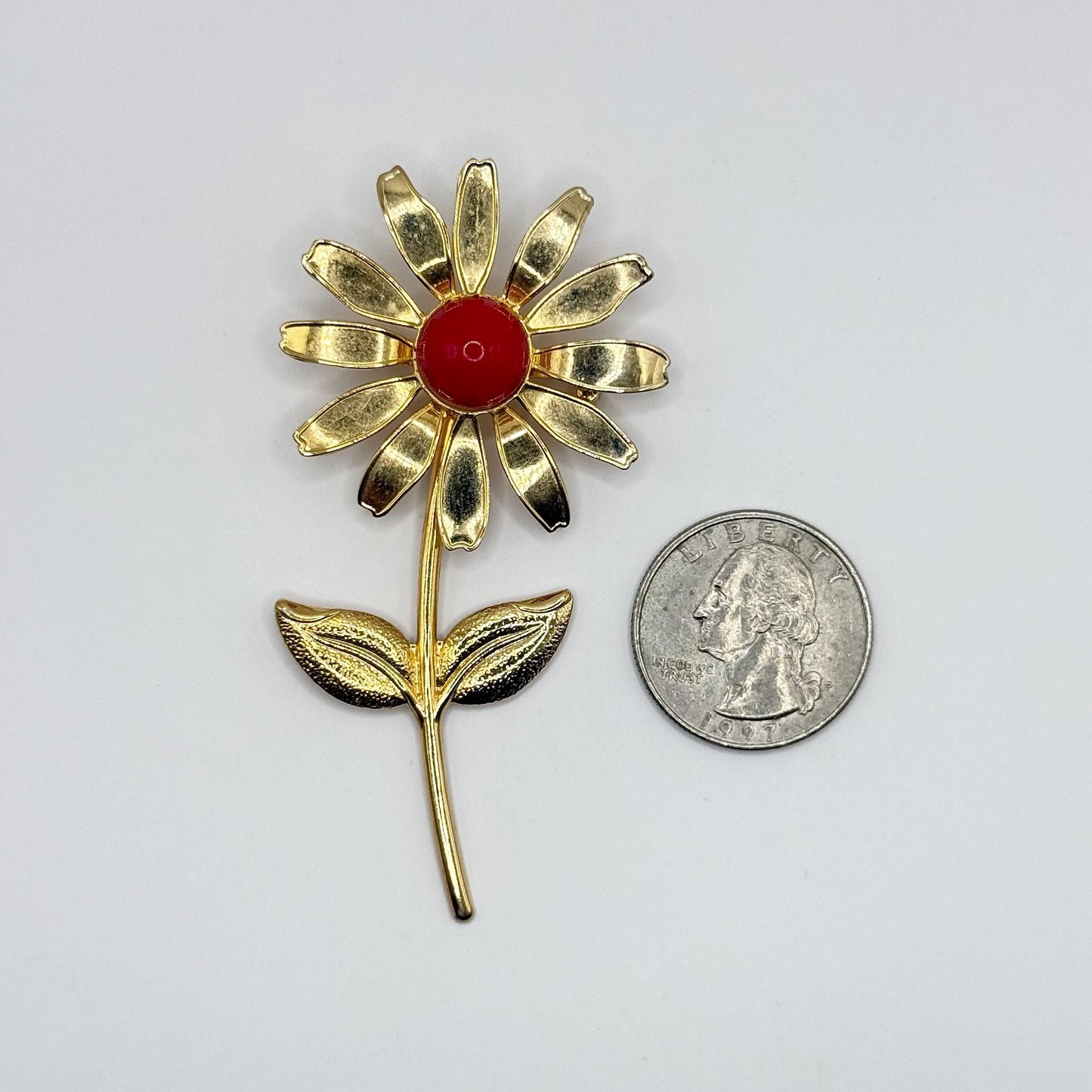 Vintage Metal Daisy Brooch in Gold Tone with Red Enamel Center