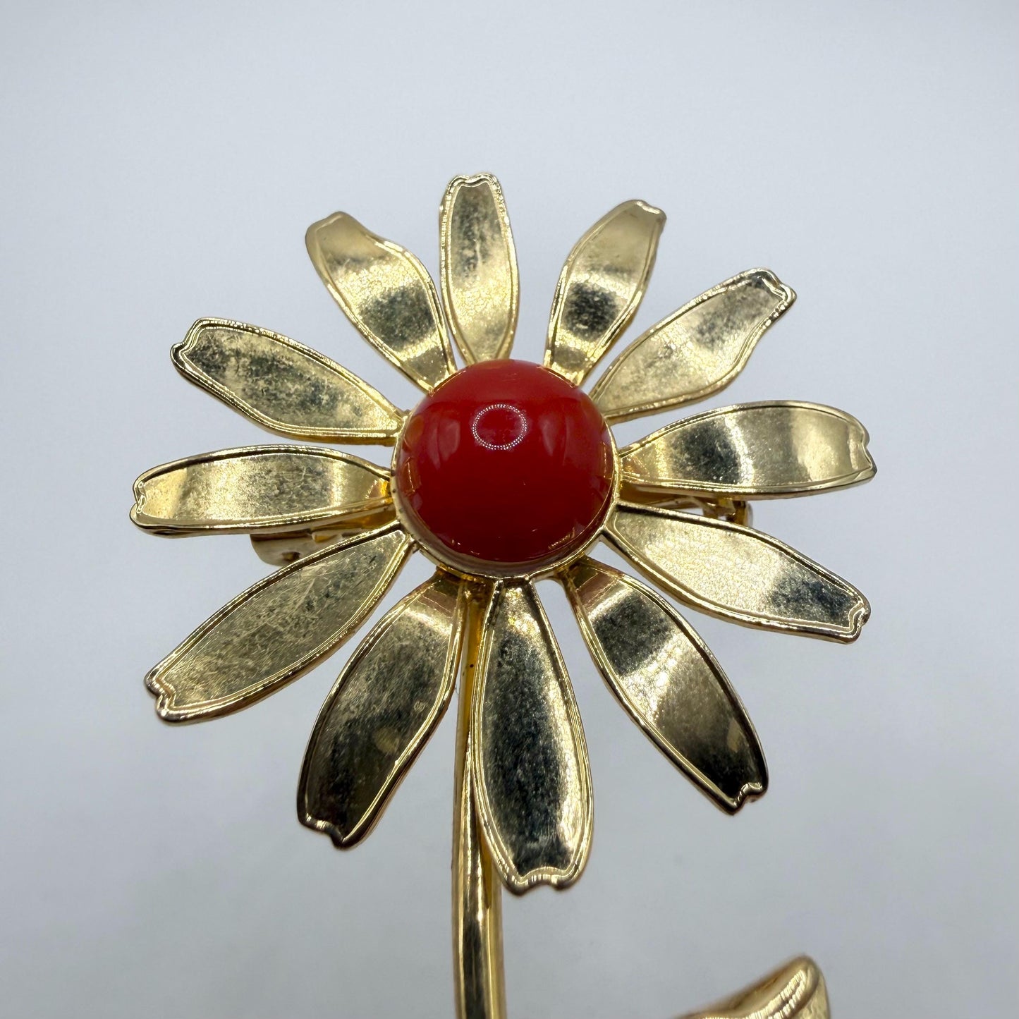 Vintage Metal Daisy Brooch in Gold Tone with Red Enamel Center