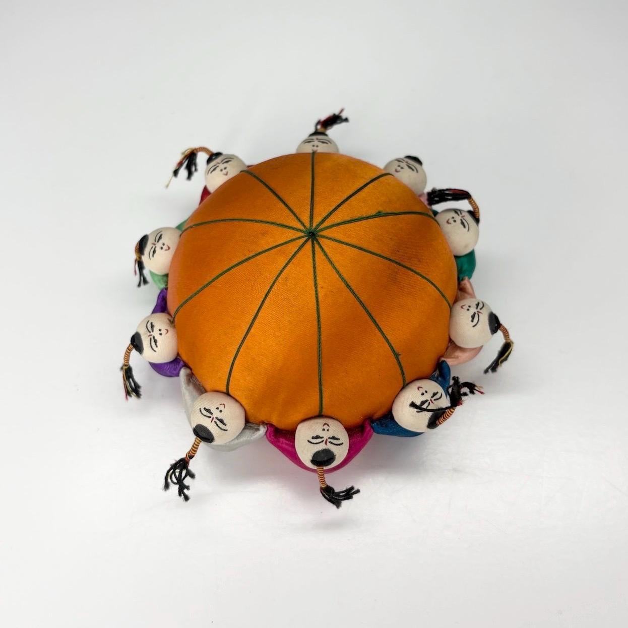 Vintage Pin Cushion with Orange Silk and Children Playing & Made in China