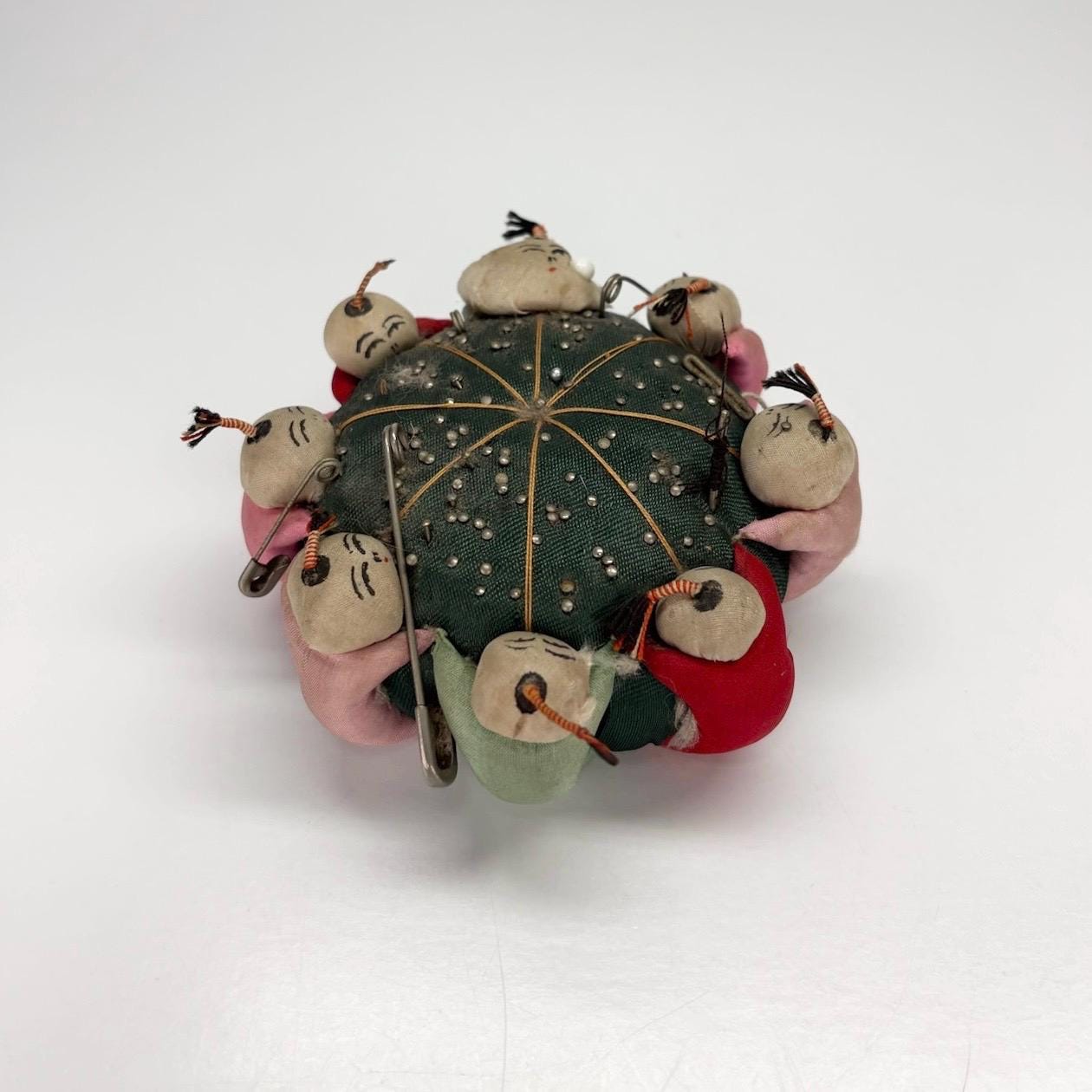 Vintage Pin Cushion with Green Silk and Children Playing Made in Japan