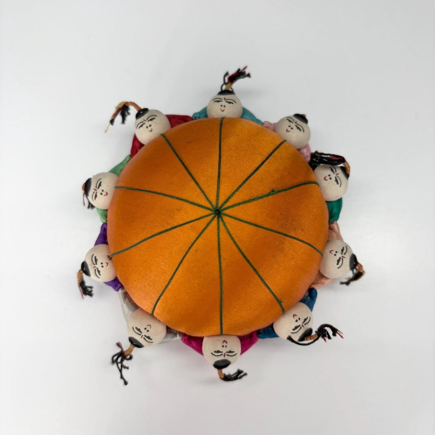Vintage Pin Cushion with Orange Silk and Children Playing & Made in China