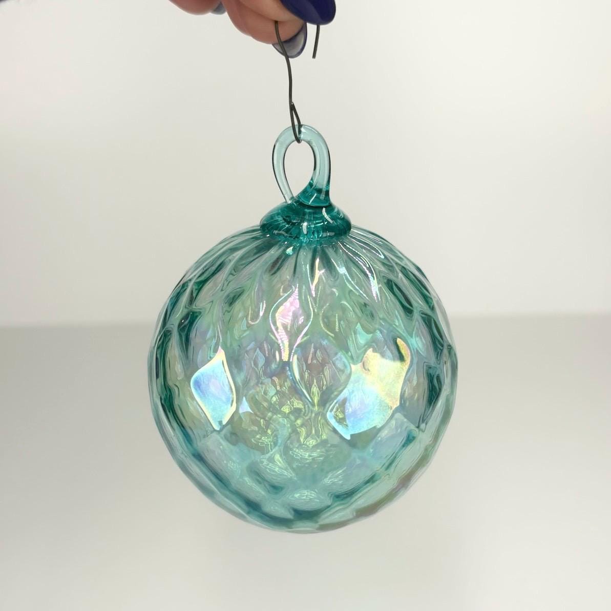 Vintage Hand Blown Aquamarine Blue Ornament with a Diamond Optic Pattern and Iridescent Finish