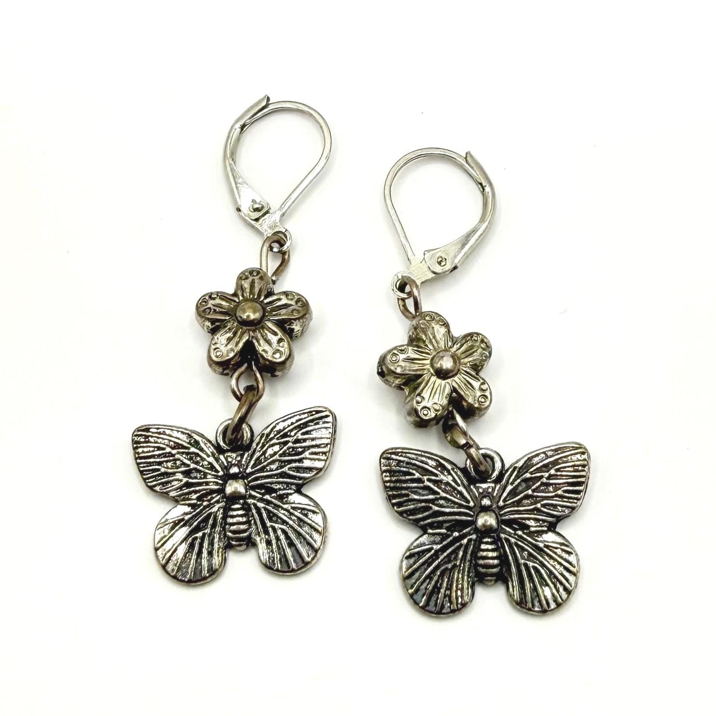 Metal Dangle Earrings in Silver Tone with Flower and Butterfly Design